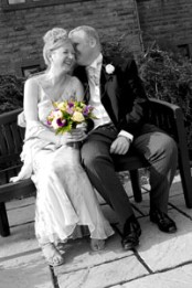Black and white photo with coloured bouquet